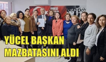 Yücel Erişen mazbatasını ekibiyle beraber aldı