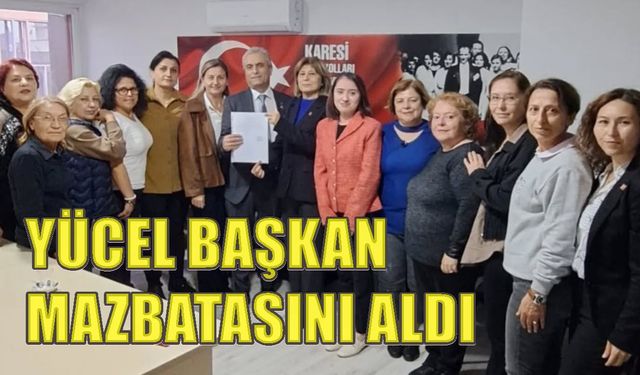 Yücel Erişen mazbatasını ekibiyle beraber aldı